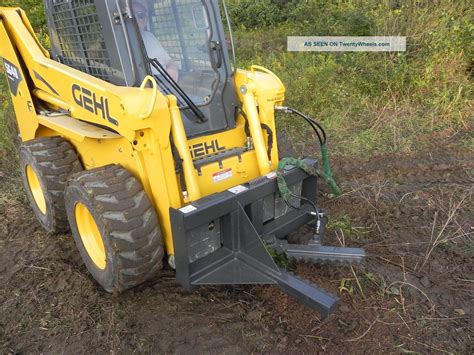 skid steer post grabber|bobcat skid steer puller.